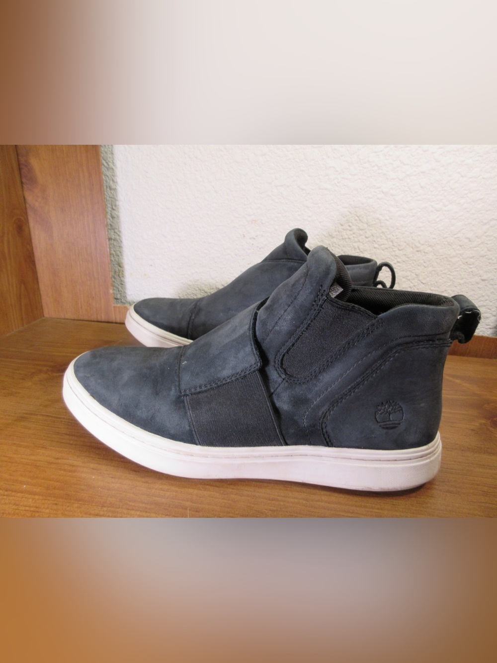 Timberland women's Black High-Top Slip-On Sneakers with White Sole